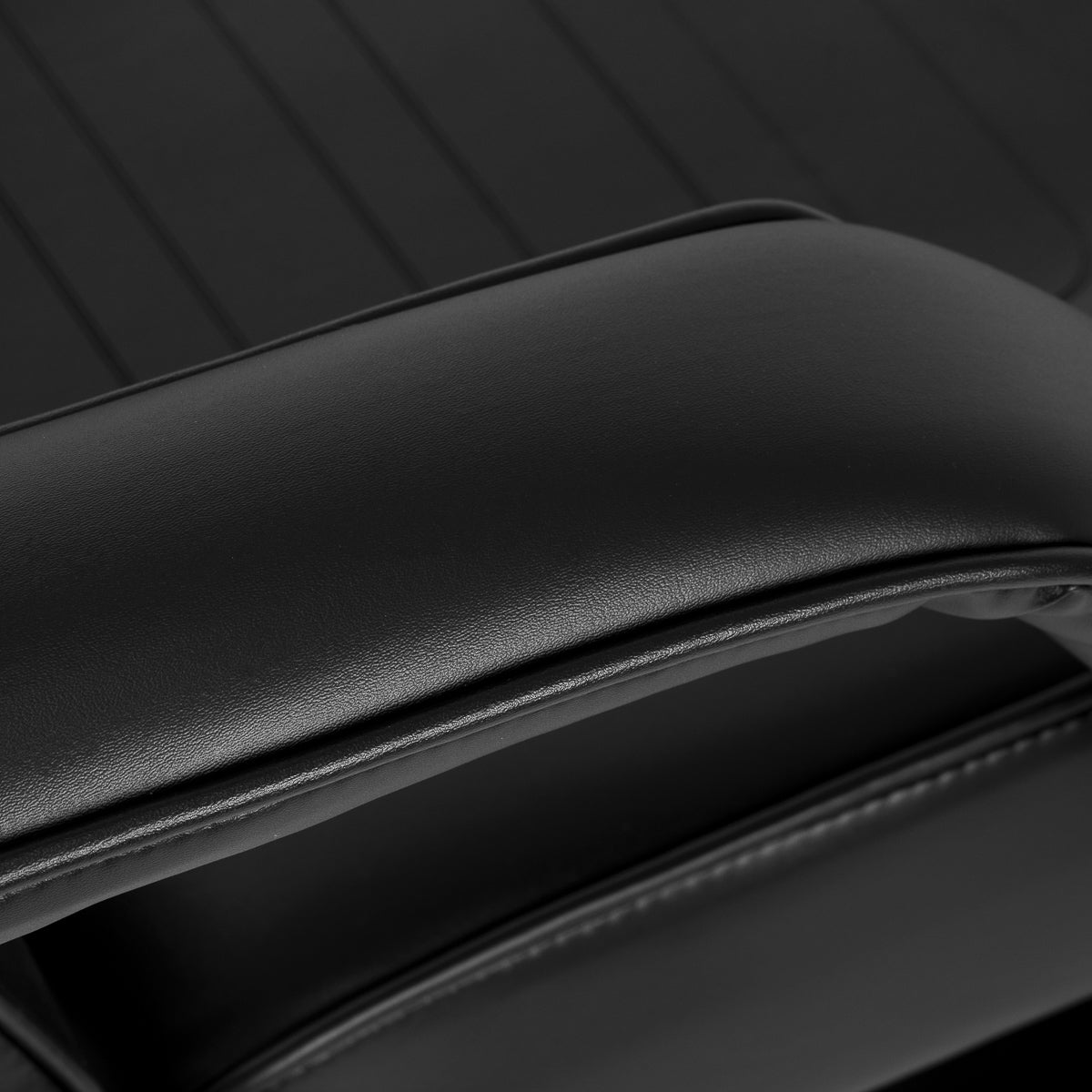 Black hydraulic salon chair with ergonomic studio design