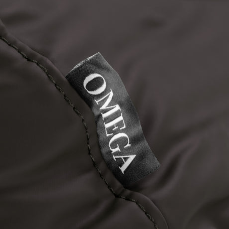 Omega brown headrest for hairdressing wash unit, cushioned support with adjustable design for salon comfort.