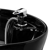 Omega Marina black hairdressing wash unit with sink and chair for salon styling and hair washing services.