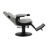 Gabbiano Levi barber chair in grey with black frame, featuring padded seat and adjustable headrest for barbershop use.