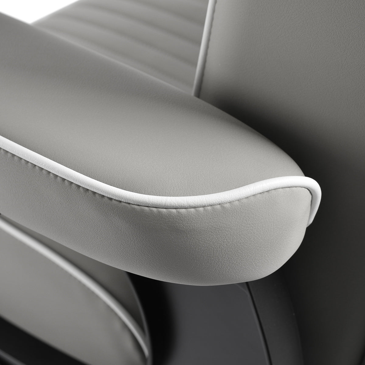 Gabbiano Levi Barber Chair in grey with black frame, featuring padded seat and backrest for barbershop styling and comfort.