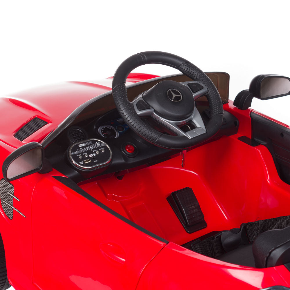 Children's red hairdressing chair by Beauty System, featuring a sturdy design and comfortable seating for young clients.
