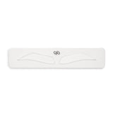 The Perma Eyebrow Shape 1pc, a sleek eyebrow shaping tool from The Perma showing its design and texture.
